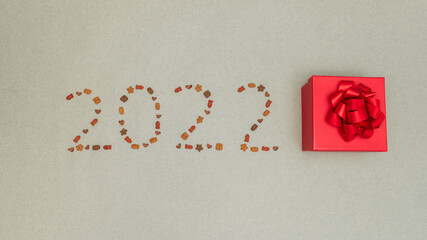 numbers 2022 made on isolated gray background from kitten cat food. High quality photo