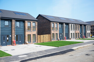 Fototapeta na wymiar New housing development building houses for increased demand for buyers