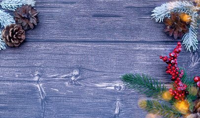 Christmas wooden background with a tet and a Christmas tree toy.