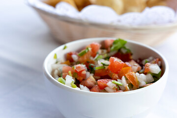 Closeup of Tomato Salsa and Tortilla Chips