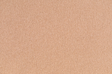 Fototapeta premium Knitted woolen or cashmere texture background. Warm sweater, pullover pattern closeup