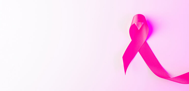 Cancer awareness. Health care symbol pink ribbon on white background. Breast woman support concept. World cancer day.