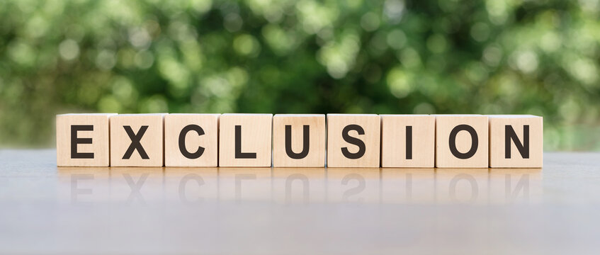 light cubes with text of EXLUCSION on a green background