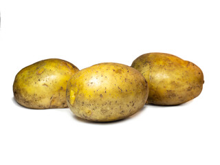Potatoes on a white background. Healthy diet.  Harvest from the garden