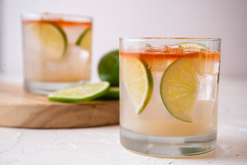 cocktail with lime and ice