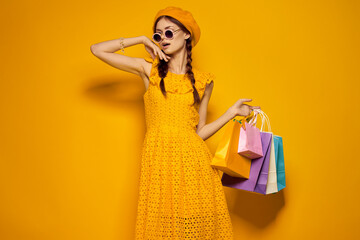 smiling woman wearing sunglasses posing shopping fashion isolated background