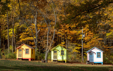 Fototapeta na wymiar Tiny cabins for rent at a rustic camp ground