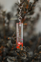 Fototapeta premium it is a beautiful key ring from epoxy resin