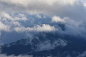 Obraz na płótnie Canvas clouds over the mountains