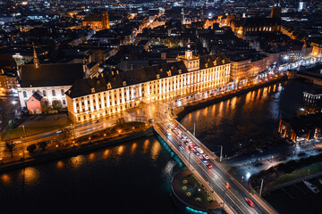 Illuminated facade of an old historic building in the city of Wroclaw, Poland