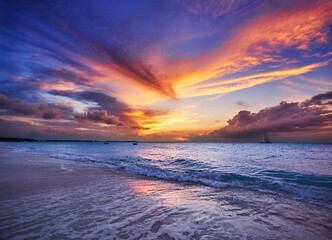 Clouds lit up by sunset.  Grace Bay Beach (at Park on Princess Drive), Providenciales, Turks and Caicos Islands