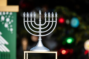 Photo of an electric silver menorah with light bulbs for Hanukkah use in a public interfaith...