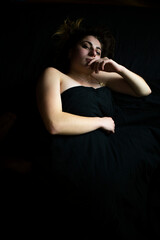 Fototapeta premium Girl on a black background