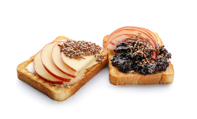 Tasty sandwiches with fruits and flax seeds on white background