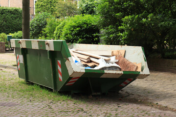 Loaded garbage dumpster