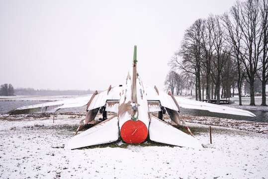 An airplane Sukhoi Su-22M4 Fitter K made in the Czech Republic on a snowy winter day, Latvia
