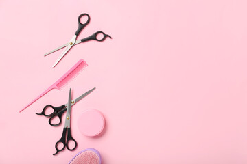 Set of hairdresser's tools on color background, top view