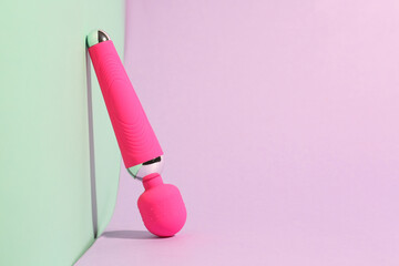 Clitoral vibrator from sex shop on color background