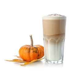 Glass of tasty pumpkin latte on white background