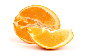 Whole orange fruit and his segments or cantles isolated on white background cutout