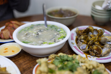 Chaozhou cuisine oyster congee and fry clam