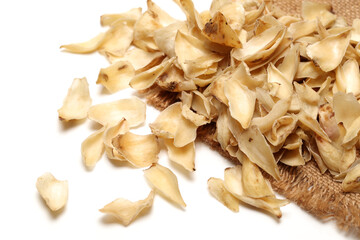 dried lily bulbs, traditional chinese herbal medicine on white background