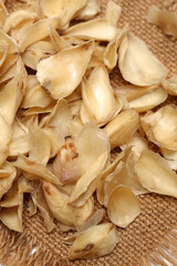 dried lily bulbs, traditional chinese herbal medicine on white background