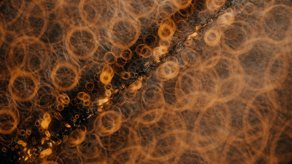 bokeh of line and lights on yellow background.