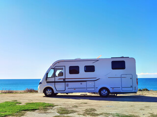 caravan car by the beach in autumn season sunny day