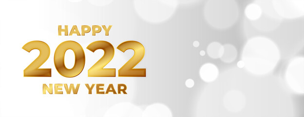 happy new year 2022 golden text bokeh banner design