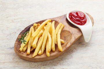 French fried potato over board