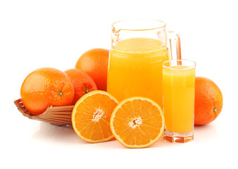 glass of orange juice and oranges