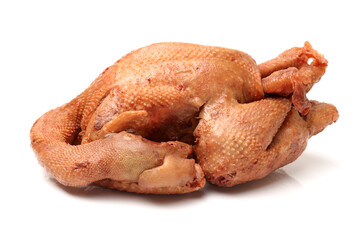 Whole roasted chicken on white background