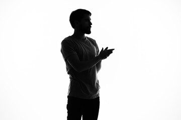 man in shadow gesture hands posing lifestyle anonymous