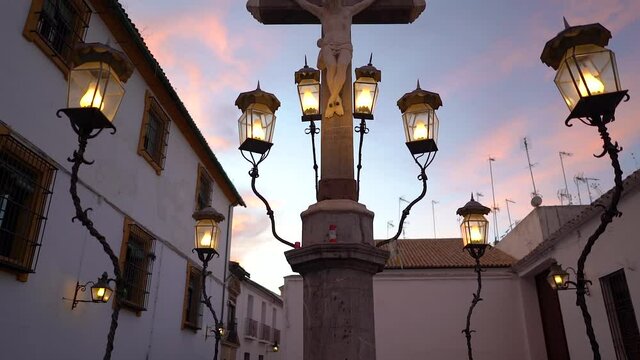 Christ of the Capuchins with his lanterns lit in at sunset in Cordoba Andalusia.