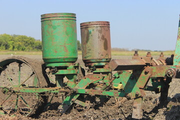 Fototapeta na wymiar old rusty tractor John Deere