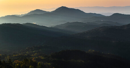 Fototapeta premium sunset in the mountains - Located in Chiang Mai Province, Doi Inthanon is the highest mountain in Thailand