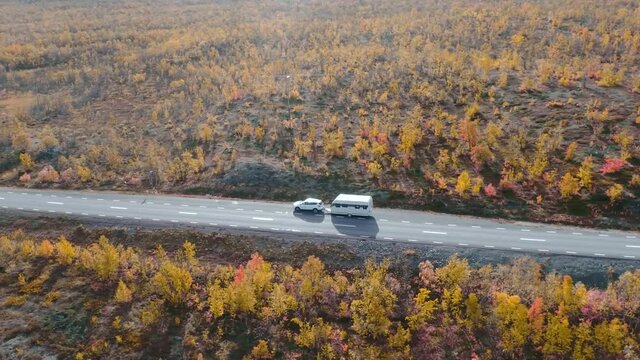 50fps drone footage Car Camping Caravan driving road lake Swedish Lapland Sunny fall colors Abisko National Park Sweden