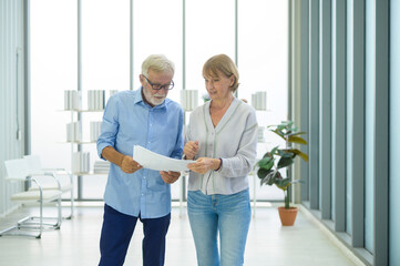 Caucasian senior Business people working and brainstorming in modern office