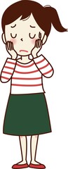 ほおに手を当てる、不安な表情の若い女性。