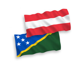 Flags of Austria and Solomon Islands on a white background