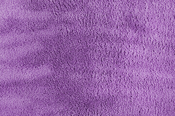 purple carpet or fabric texture background closeup