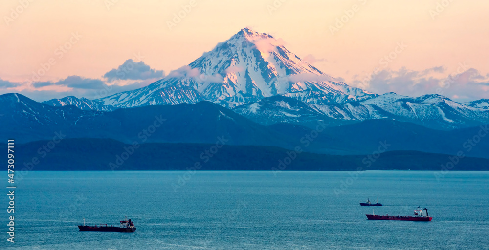 Wall mural kamchatka peninsula, russia. world popular tourist destination, volcanoes of kamchatka. russian tour