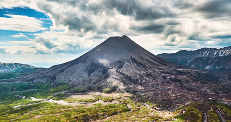 Volcanoes of Kamchatka, Russia. Travel and tourism on the Kamchatka peninsula. Adventure with active hiking and mountaineering