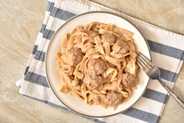 Swedish meatballs with pasta on a plate