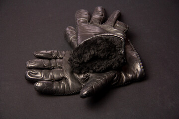 Winter black leather gloves with fur. Wardrobe