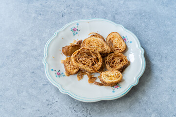 Crunchy Brittle Croissant Slices in Plate. Ready to Eat and Serve.