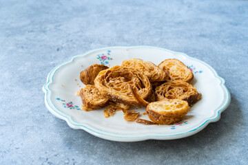 Crunchy Brittle Croissant Slices in Plate. Ready to Eat and Serve.