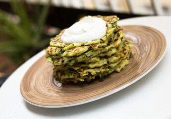 fried zucchini pancakes with greek yogurt