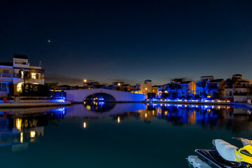 Night landscape of Limassol Marina as a concept of tourist trips to Cyprus